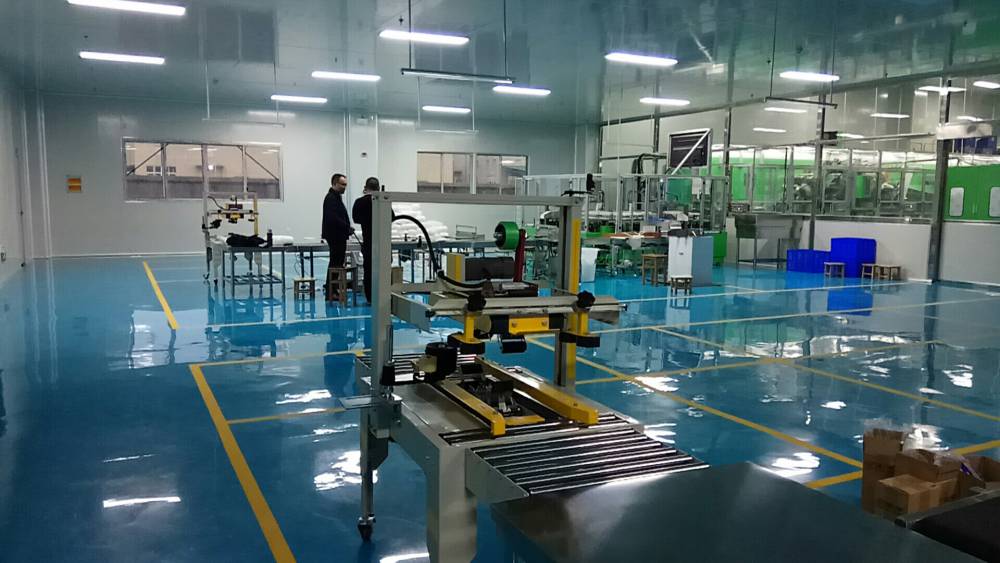 Zhongxiang Supply offers the FXJ5050 Cross-Adhesive Automatic Box Sealing Machine with Automatic Cor